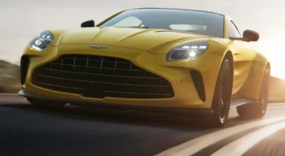 Front view of a yellow Aston Martin Vantage