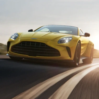 Front view of a yellow Aston Martin Vantage